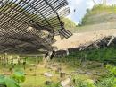 The main collecting dish at Arecibo is among the world’s largest single-dish radio telescopes. The reflective dish is 1,000 feet in diameter, 167 feet deep, and covers an area of about 20 acres.